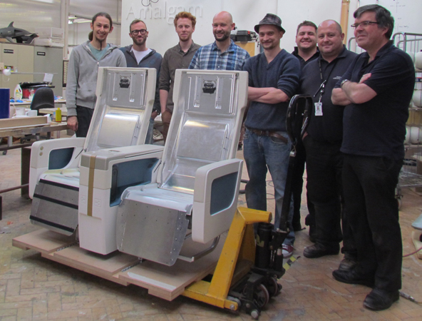 A proud team around the last full size mock-up seat